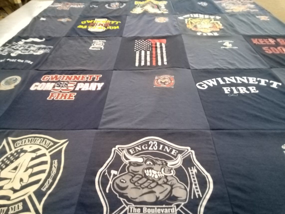T-shirt quilt with firefighting, community service themes by Amanda from GA