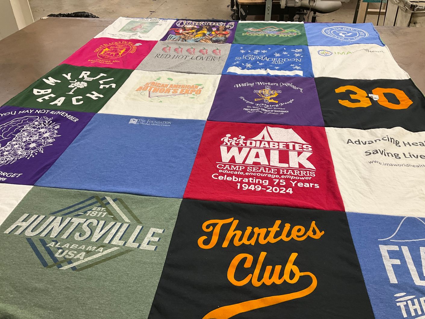 T-shirt quilt with health, community themes by Donna from AL