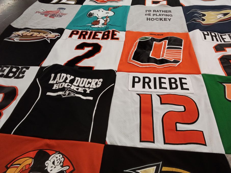 T-shirt quilt featuring lady ducks hockey by Mary from CA