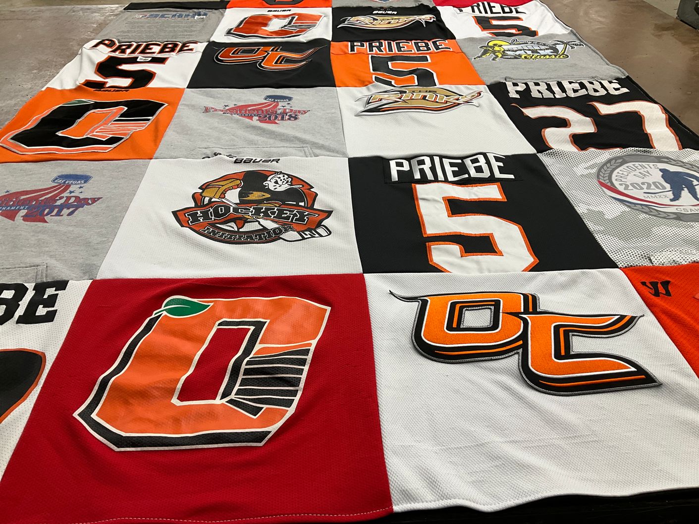 T-shirt quilt with hockey themes by Mary from CA
