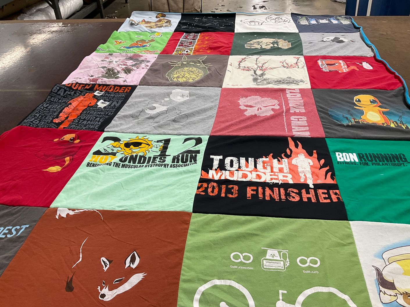 T-shirt quilt with fitness, running themes by Susan from TX