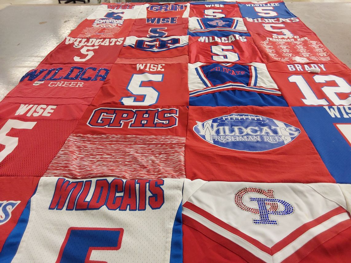 T-shirt quilt featuring grand prairie high school wildcats by Amber from TX