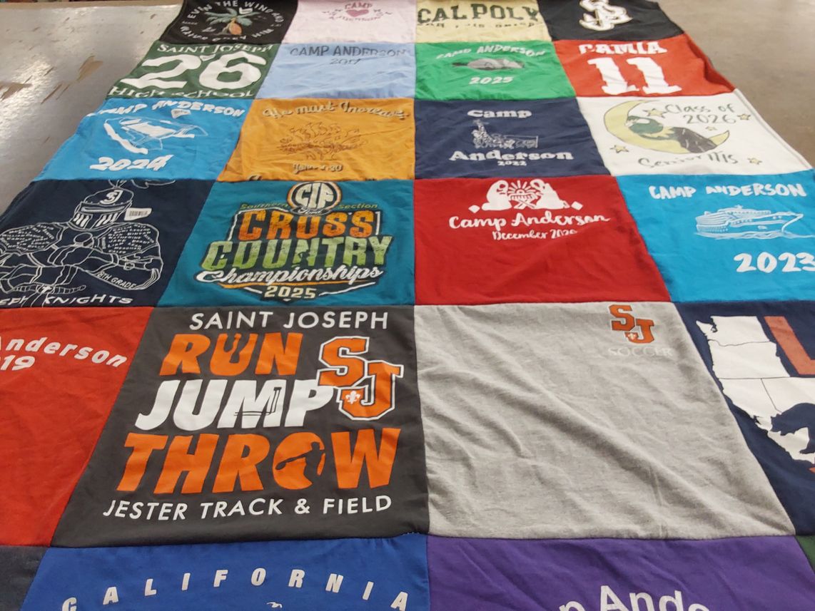 T-shirt quilt featuring saint joseph track and field by Sedelia from CA