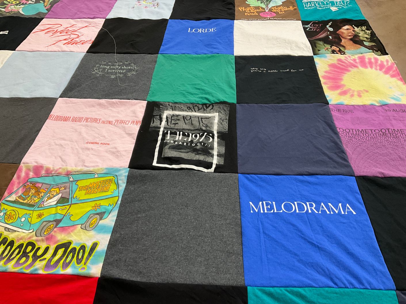 T-shirt quilt with music, movies themes by Julie from IL