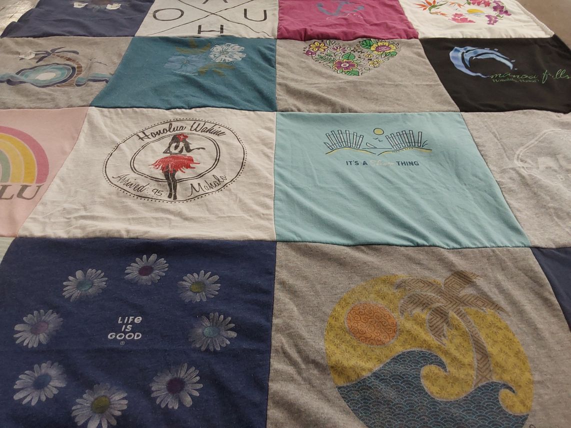 T-shirt quilt with beach, dance themes by Carol from CA