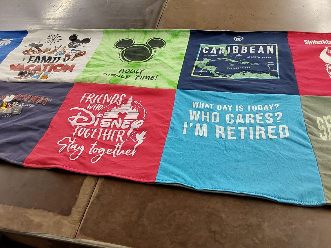 T-shirt quilt with disney, travel themes by Thomas from FL
