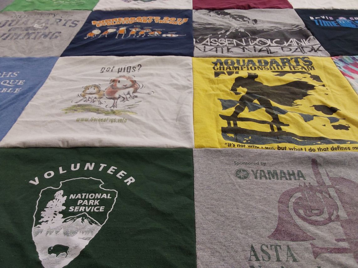 T-shirt quilt with hiking, animals themes by Melissa from CA