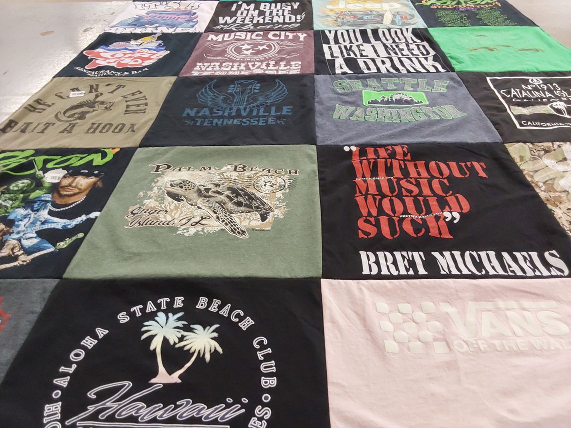 T-shirt quilt with music, travel themes by Cathi from AZ