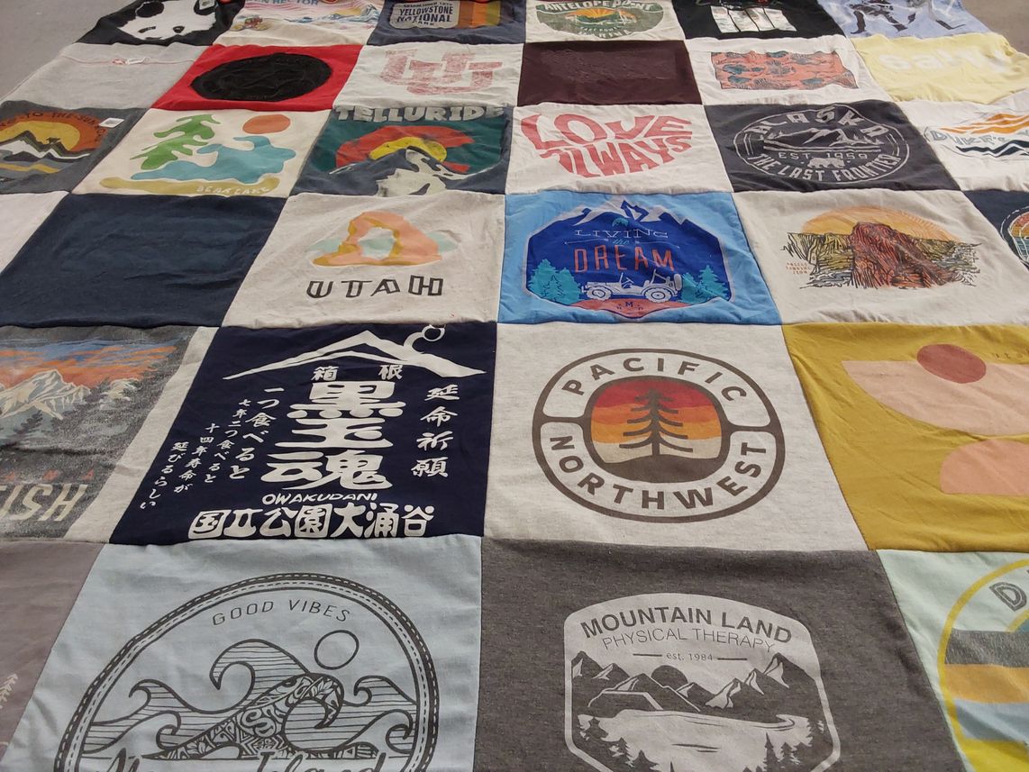 T-shirt quilt with outdoor, adventure themes by Toni from UT