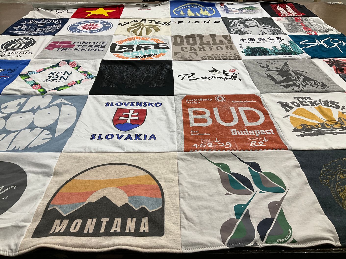 T-shirt quilt with travel, outdoor themes by Toni from UT