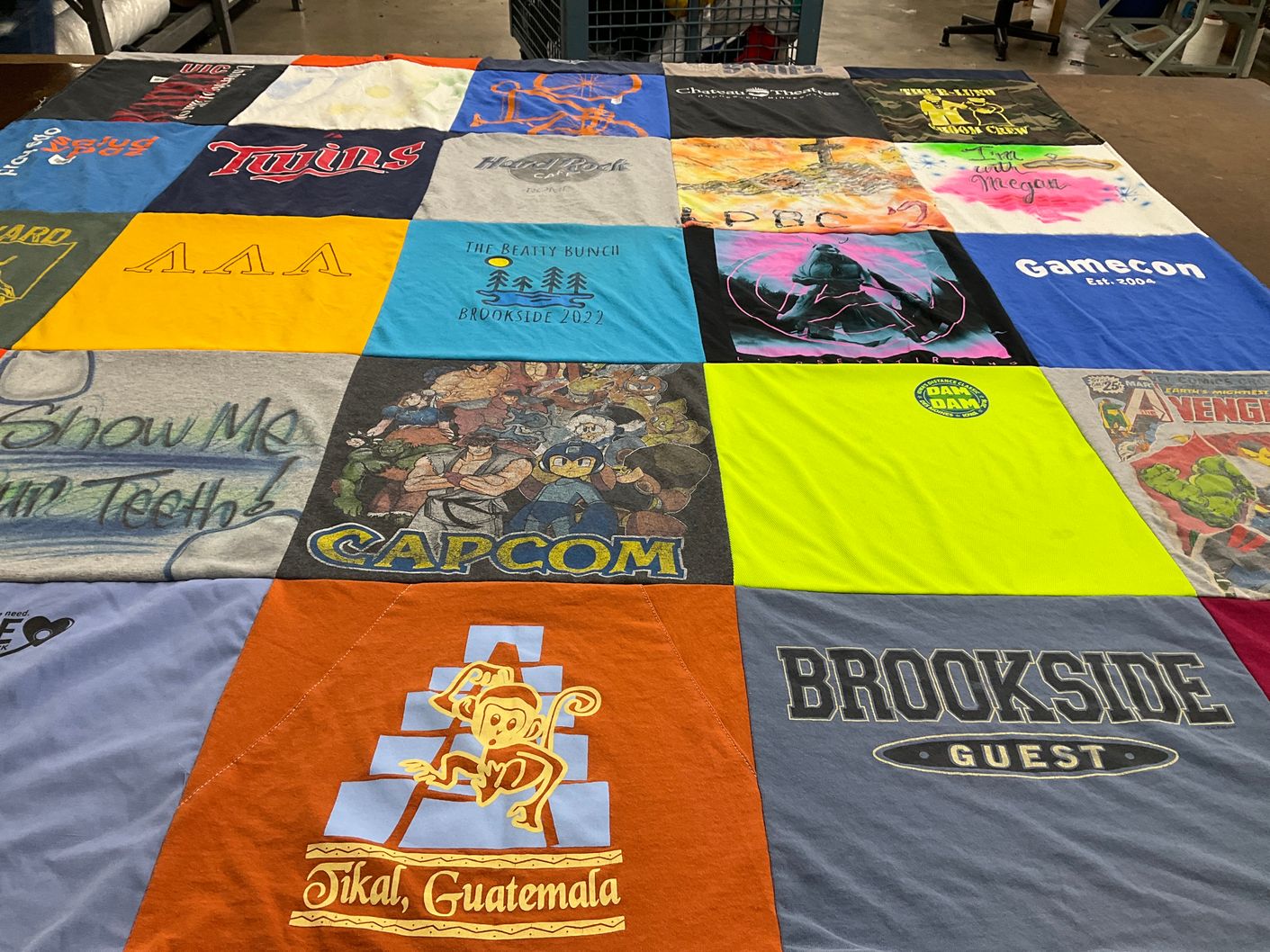 T-shirt quilt with gaming, travel themes by Megan from MN