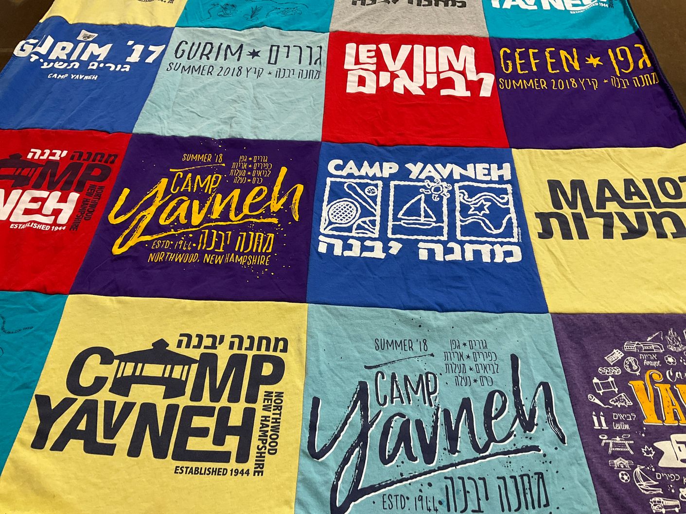 T-shirt quilt with camping, youth activities themes by Shira from MD