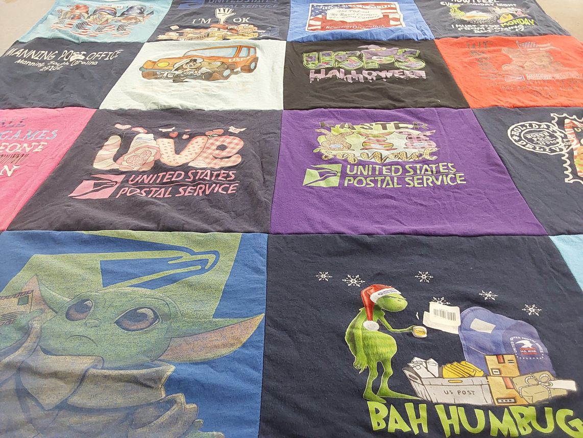 T-shirt quilt with postal services, holidays themes by Linda from SC