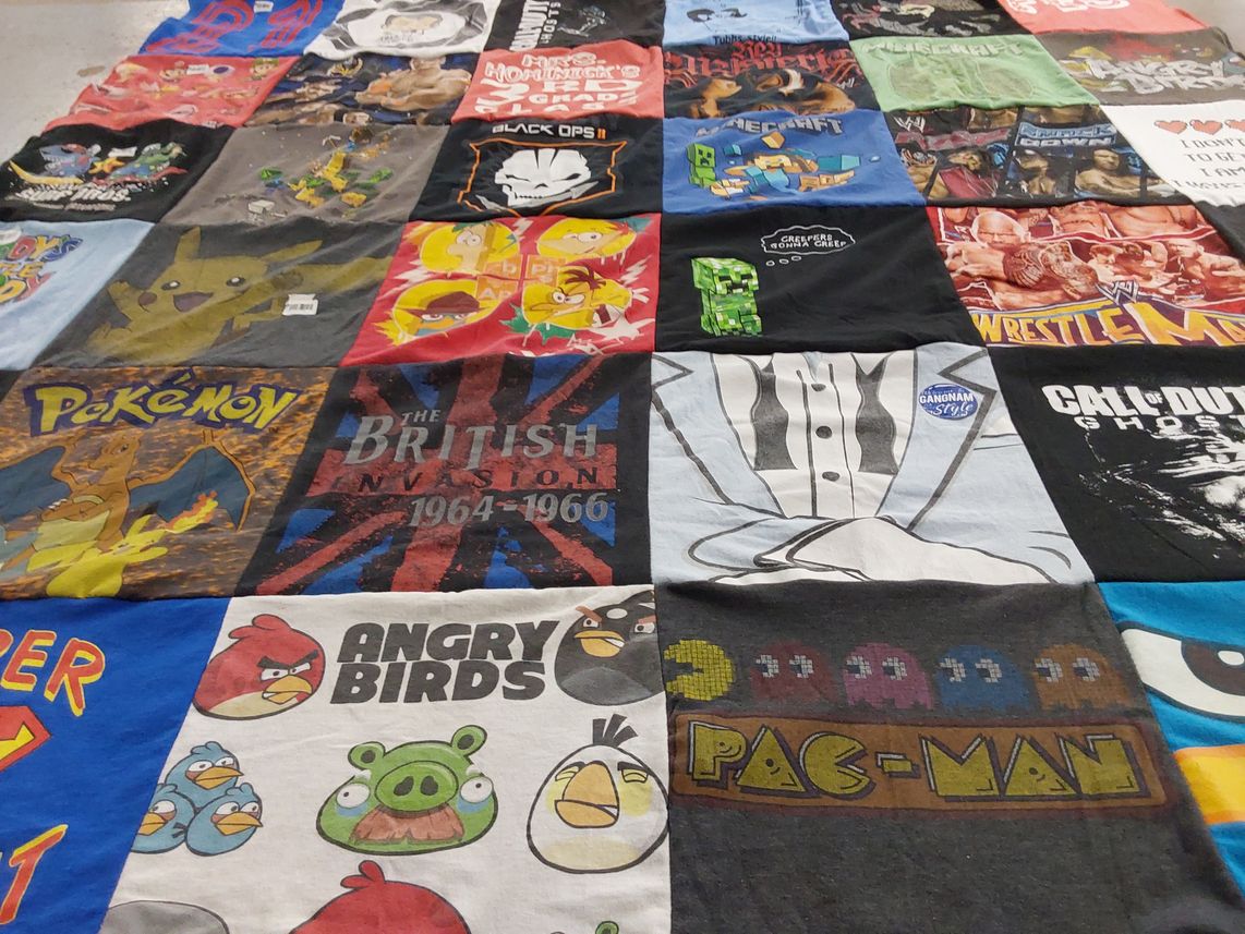 T-shirt quilt with gaming, anime themes by Pamela from TX