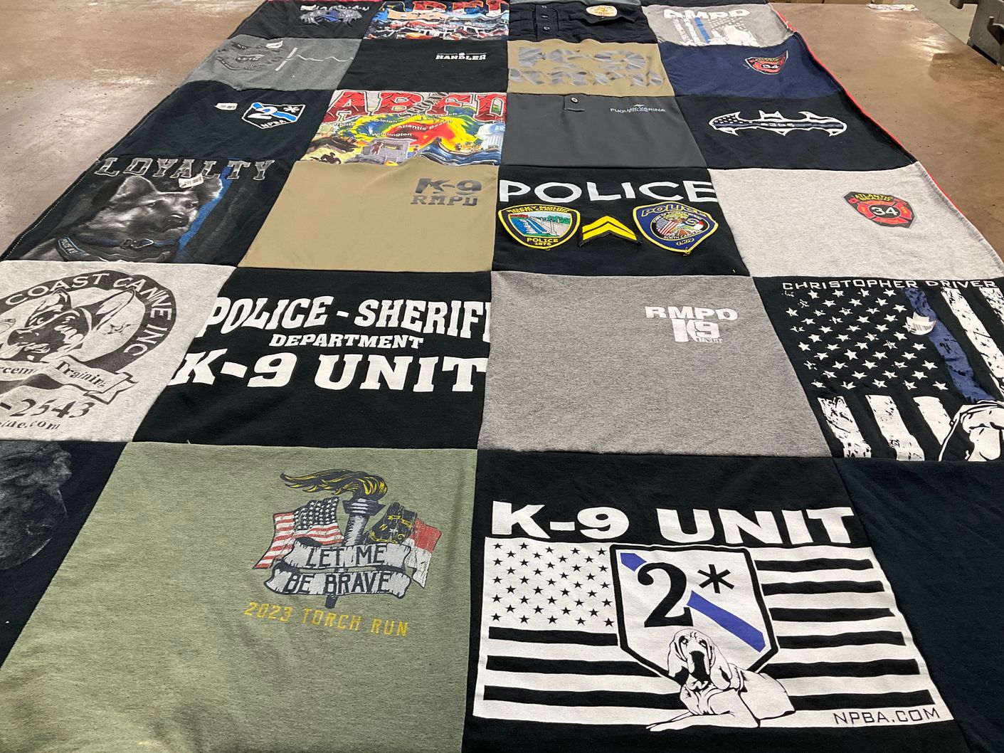 T-shirt quilt with canine, law enforcement themes by Erica from NC