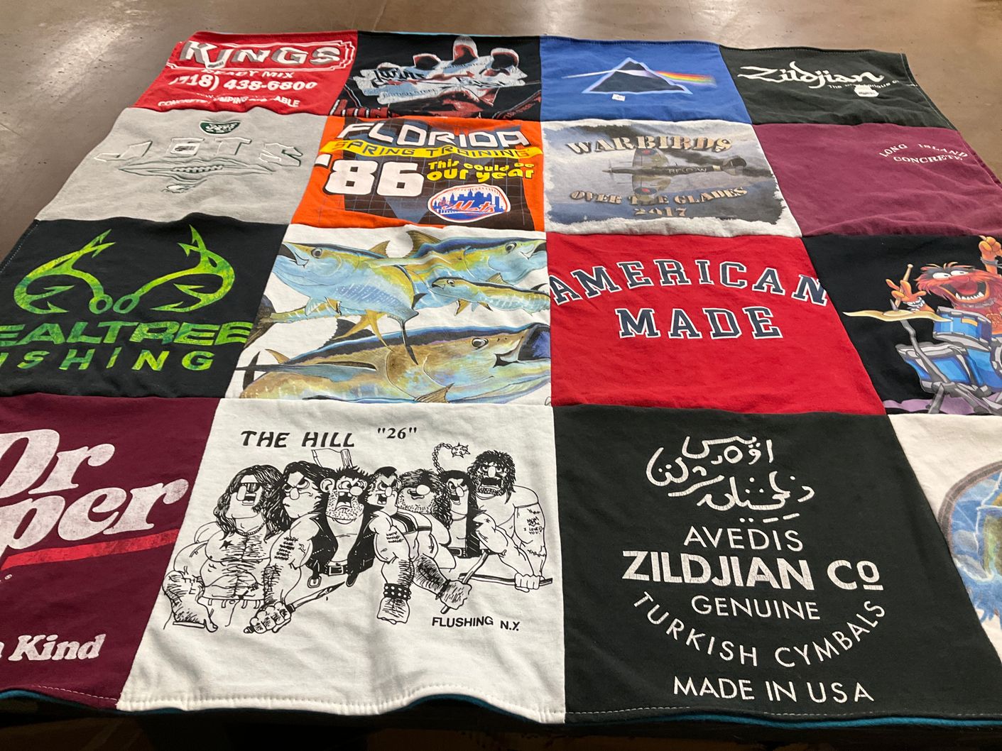 T-shirt quilt with fishing, music themes by Teresa from NY