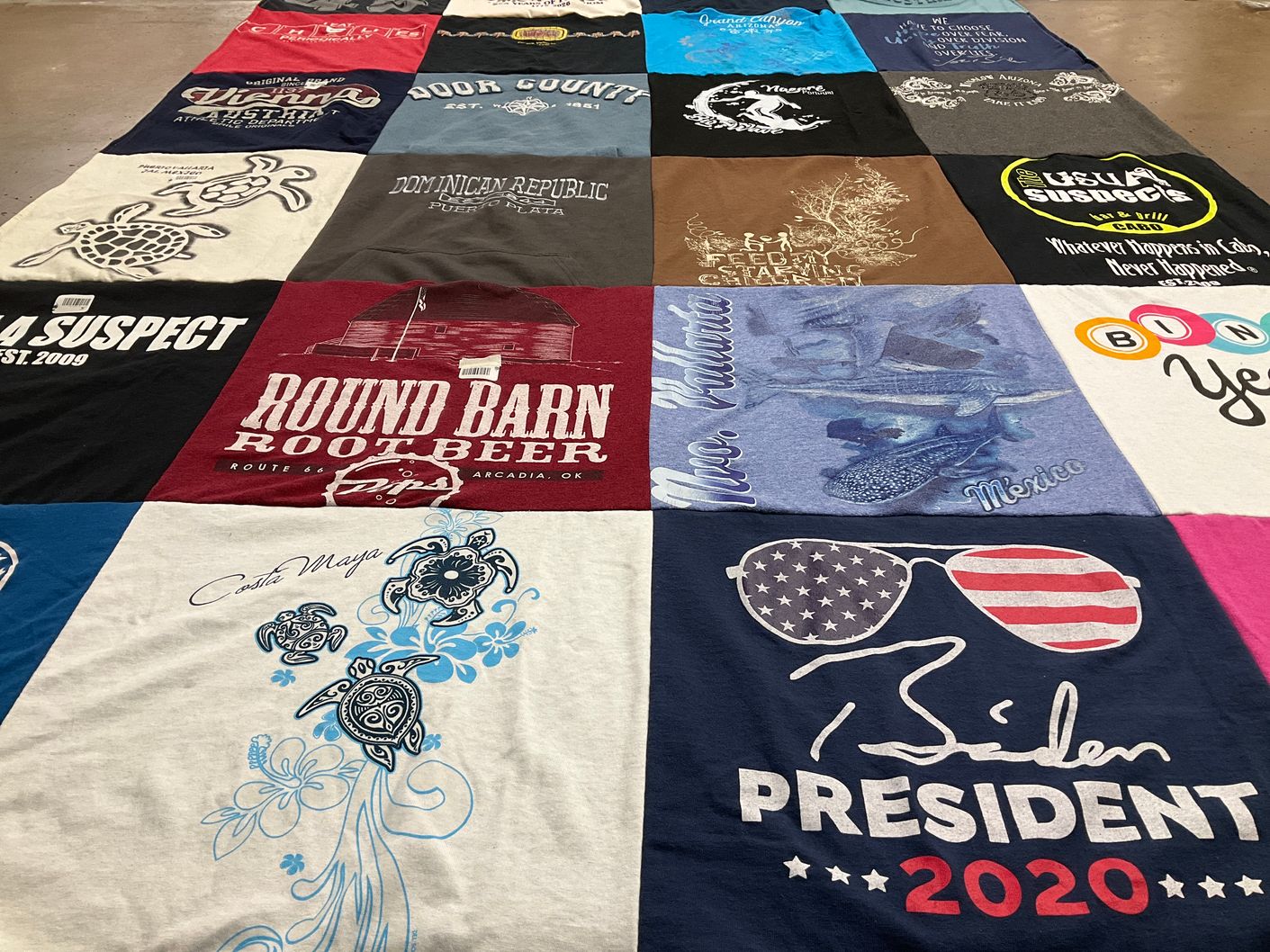 T-shirt quilt with travel, politics themes by Connie from IL