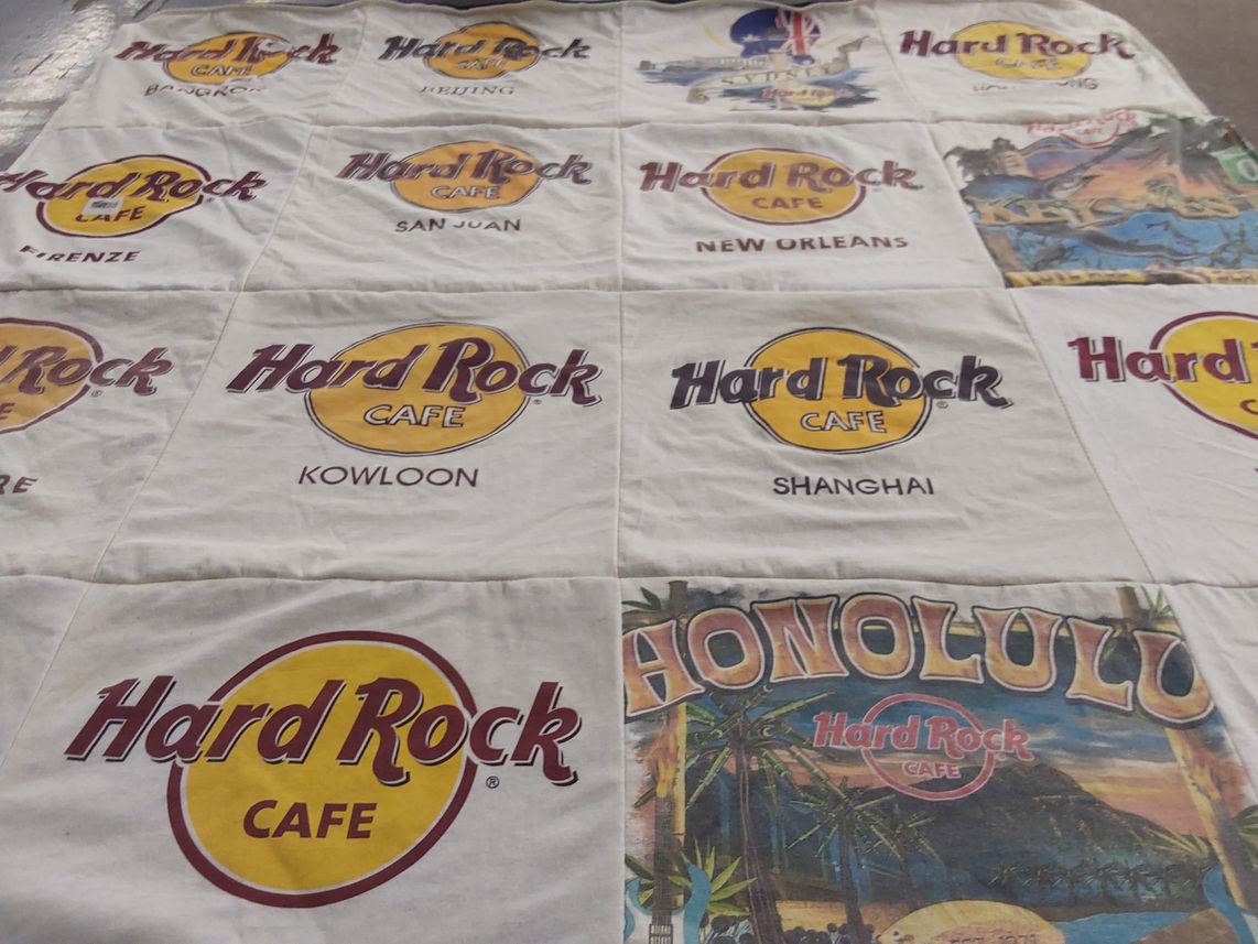 T-shirt quilt with music, travel themes by Mats from CO