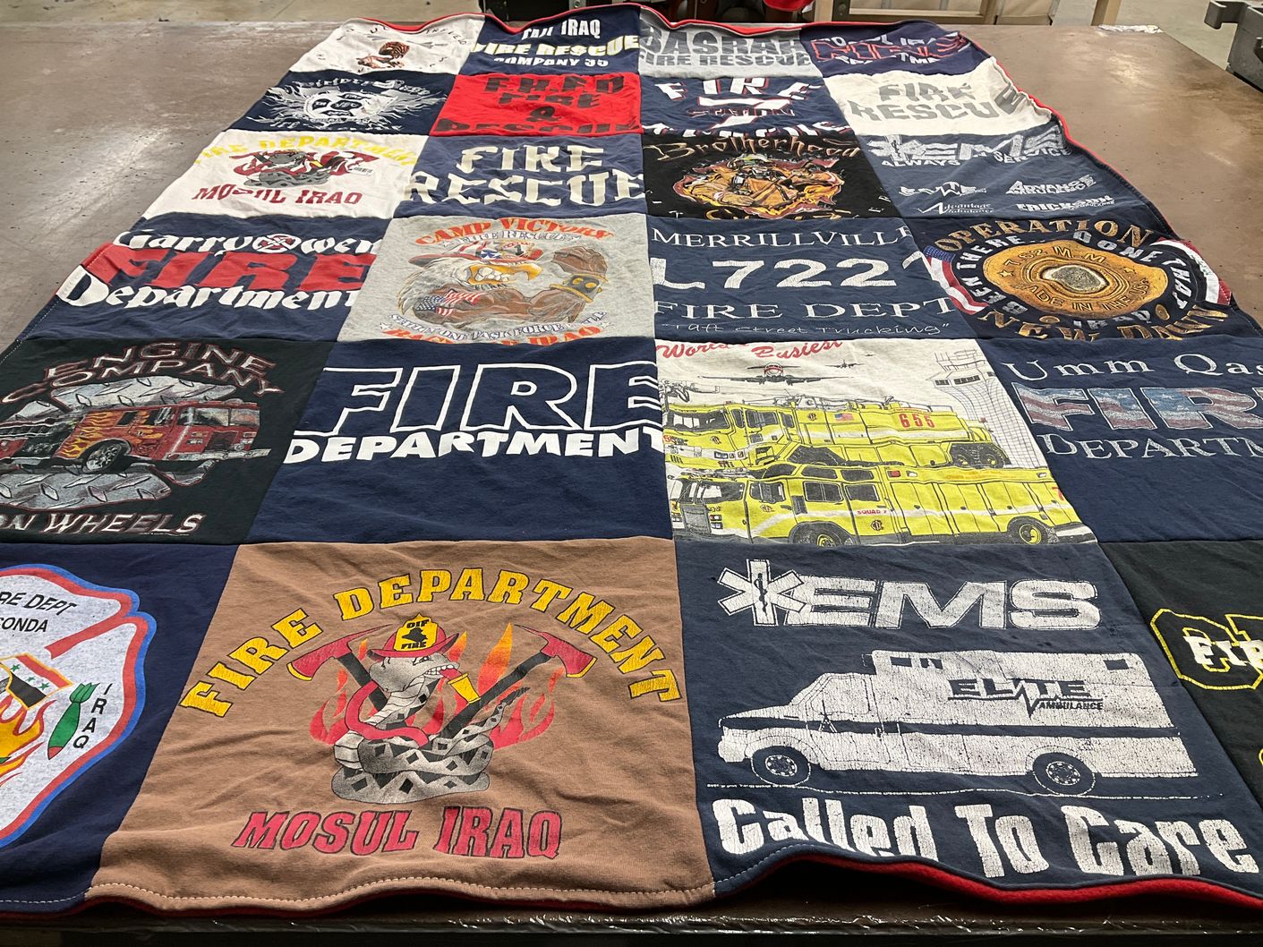 T-shirt quilt with firefighting, emergency services themes by Thomas from IN