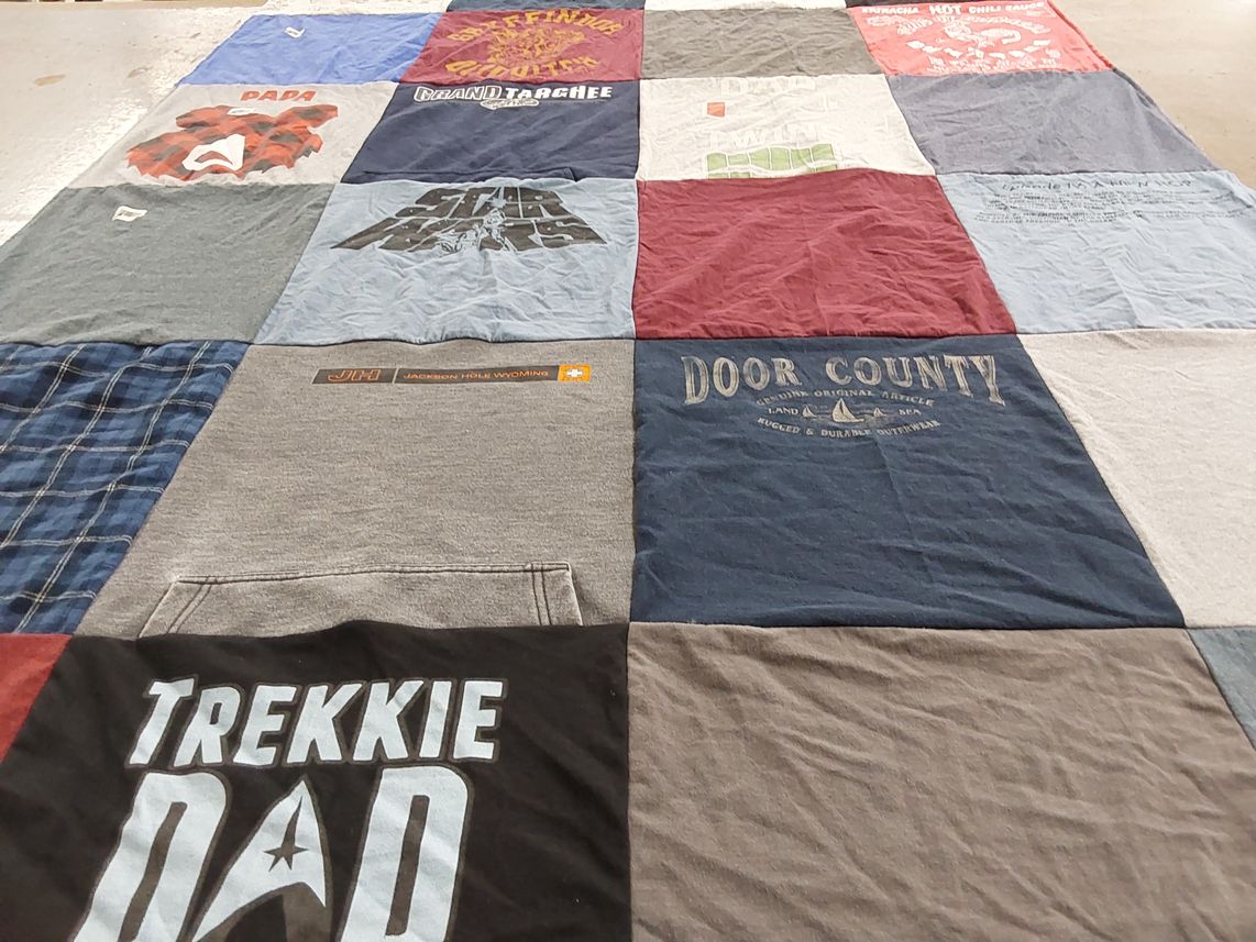 T-shirt quilt with outdoors, travel themes by Deb from NE