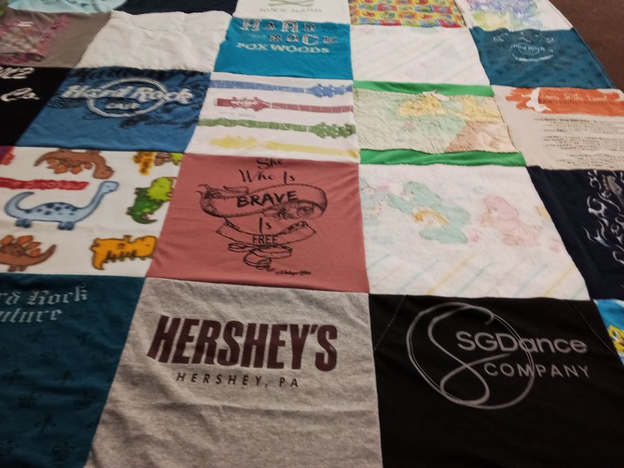 T-shirt quilt with dinosaurs, dance themes by Ashley from AZ