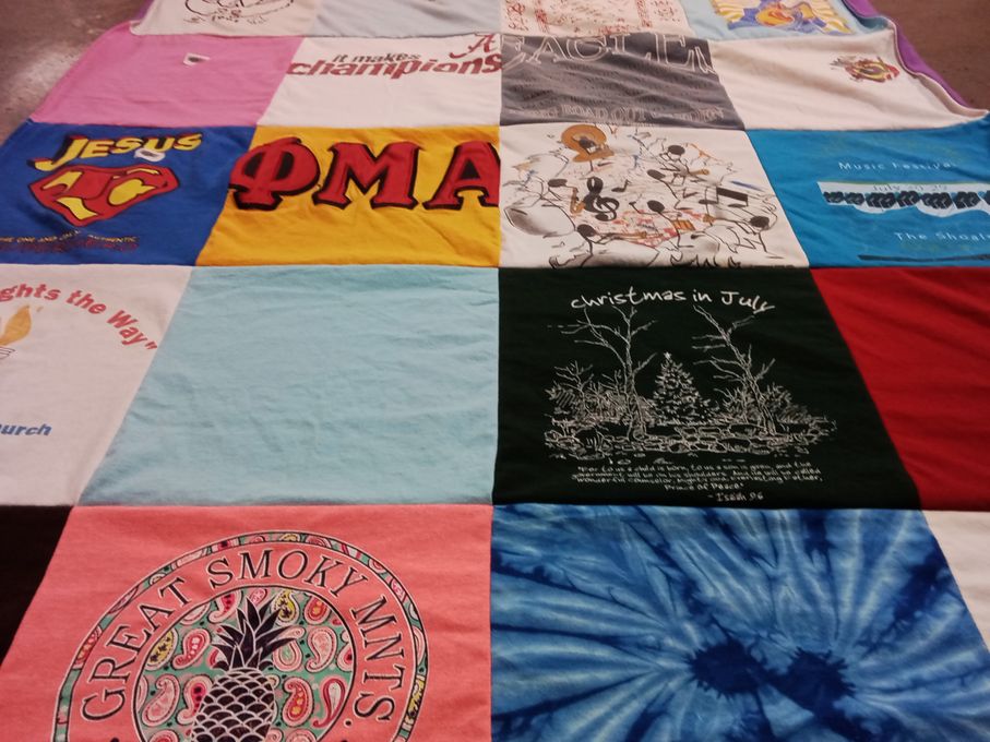T-shirt quilt with religion, music themes by Martha P from GA