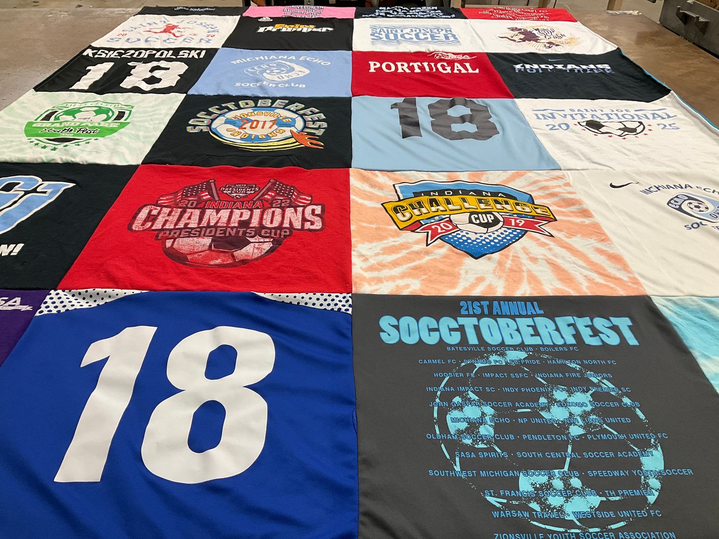 T-shirt quilt with soccer, events themes by Emily from IN