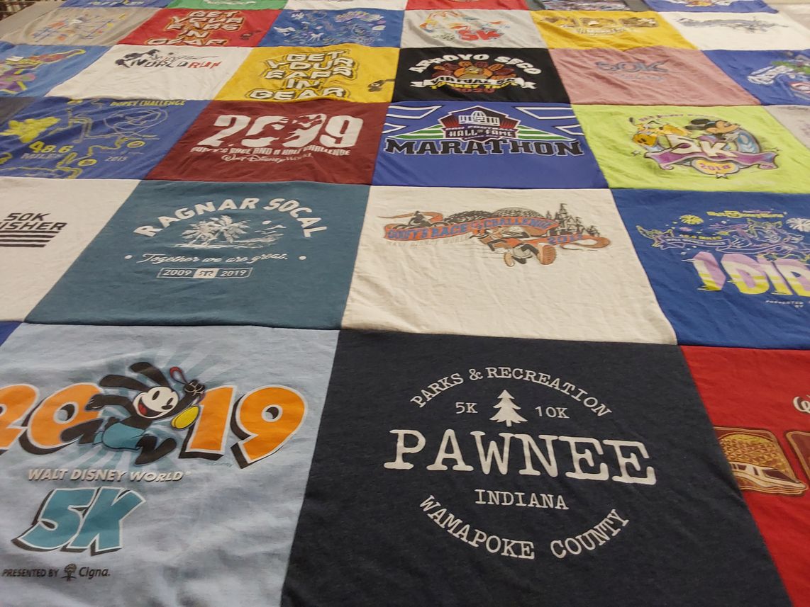 T-shirt quilt with running, disney themes by Mark from CA