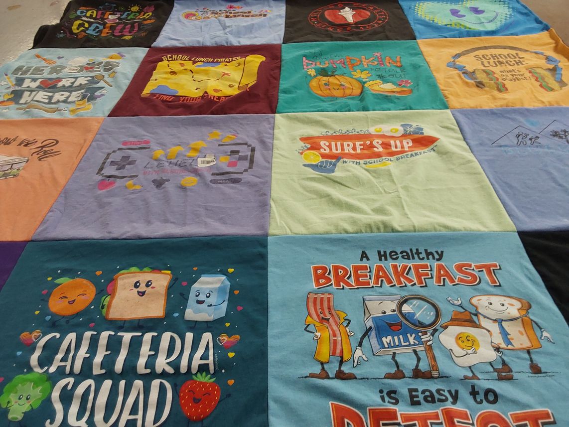 T-shirt quilt with food, health themes by Beth from VA