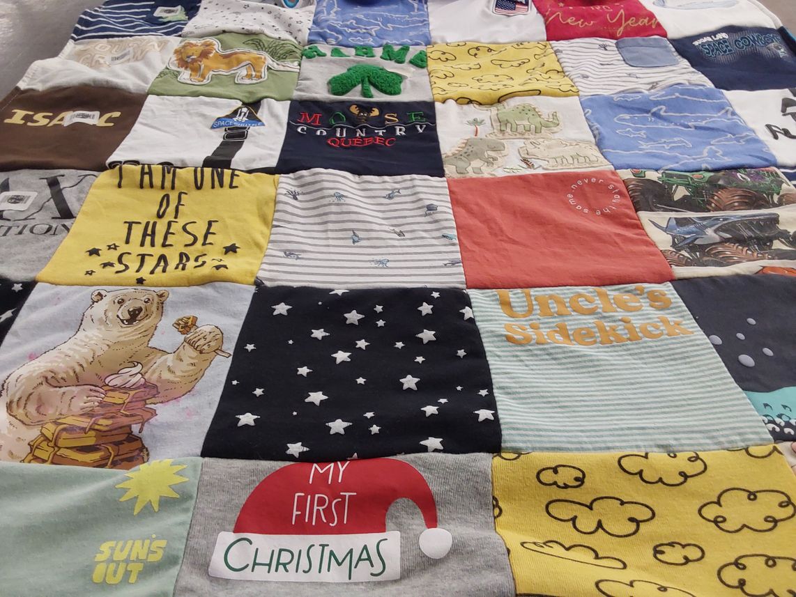 T-shirt quilt with animals, nature themes by Adrienne from TX