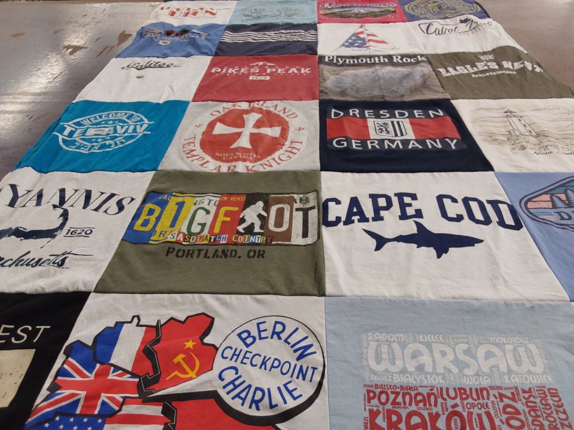 T-shirt quilt with travel, geography themes by Linda from MI