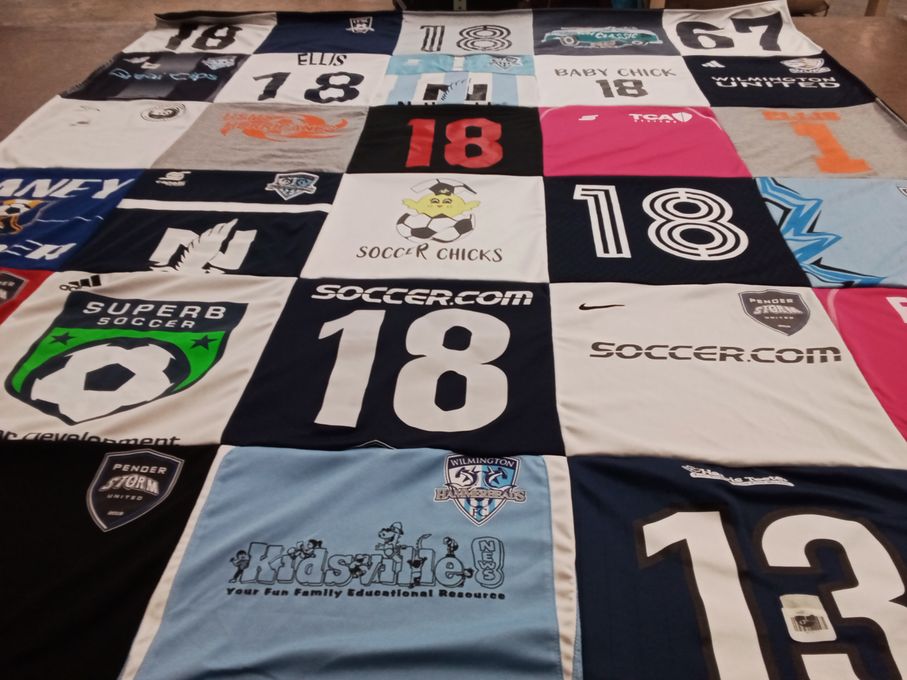 T-shirt quilt featuring pender storm united, wilmington united by Wendy from NC