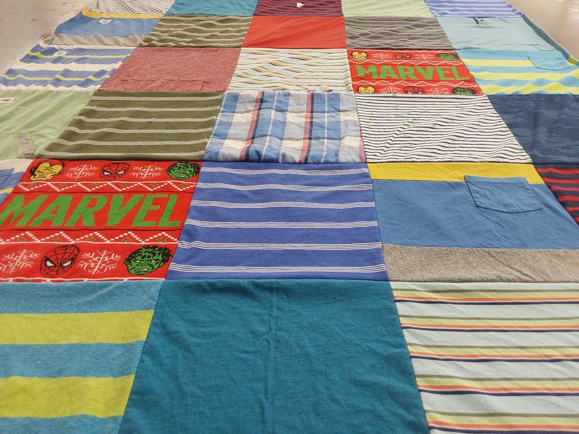 T-shirt quilt with comics, superheroes themes by Parker from OH