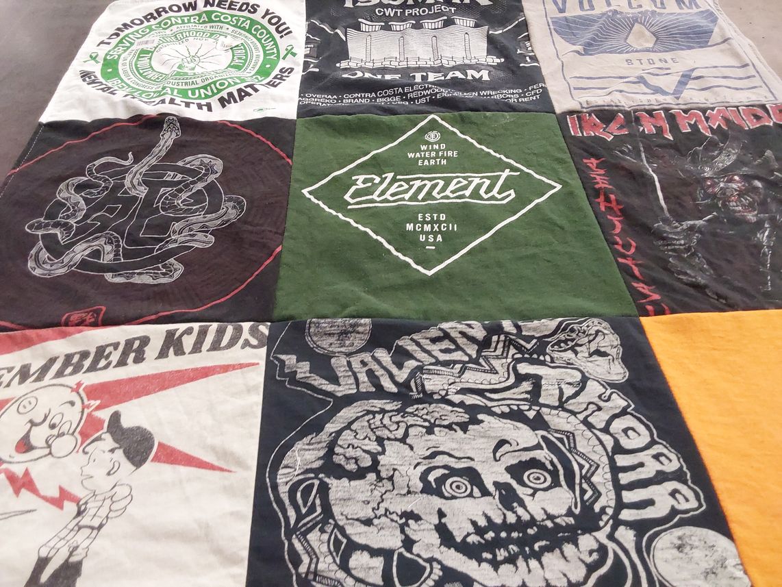 T-shirt quilt with music, skateboarding themes by Margaret from CA