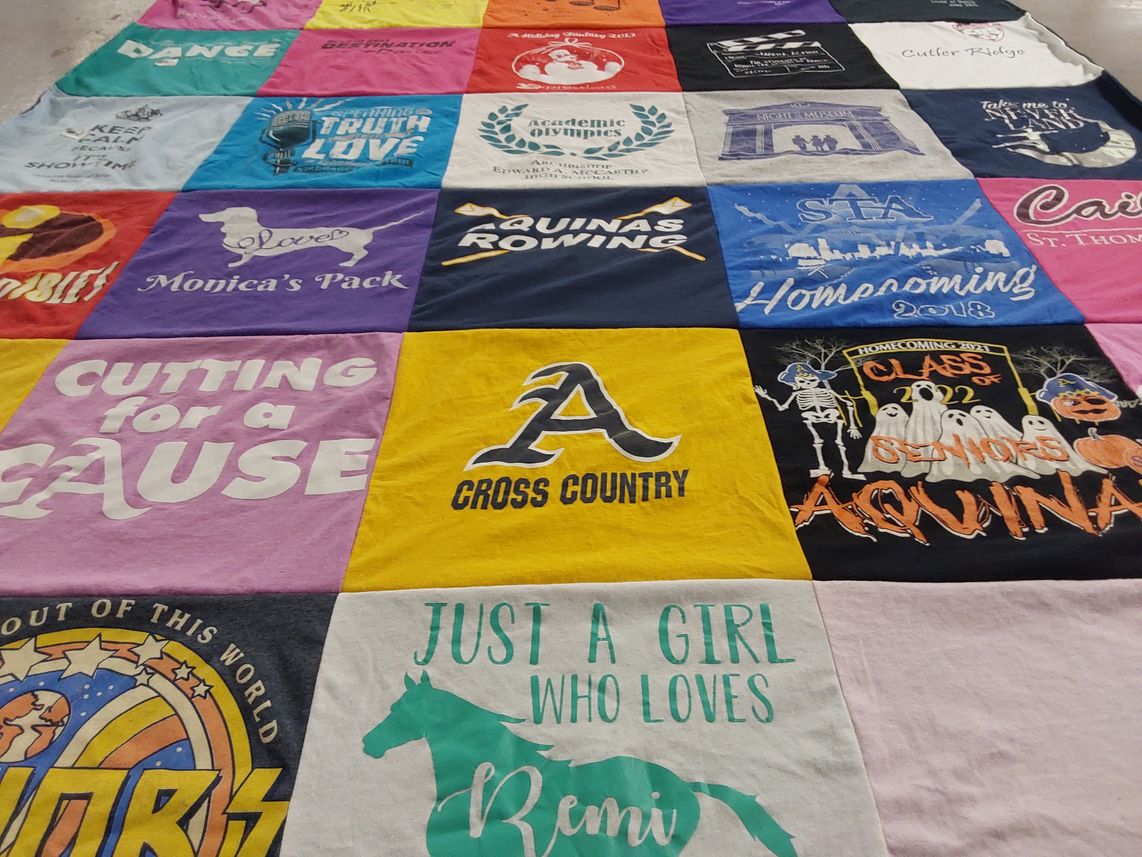 T-shirt quilt featuring aquinas college cross country by Eddie from FL