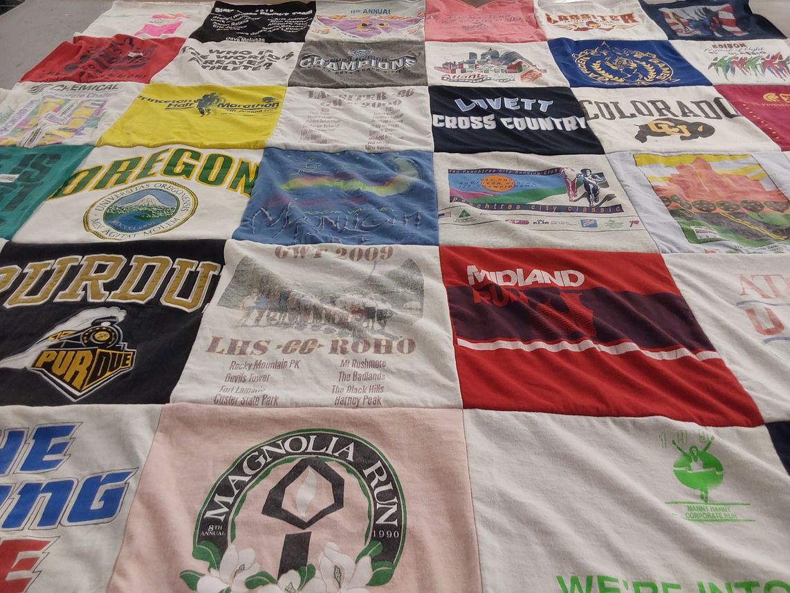 T-shirt quilt featuring lovett cross country team by David from GA
