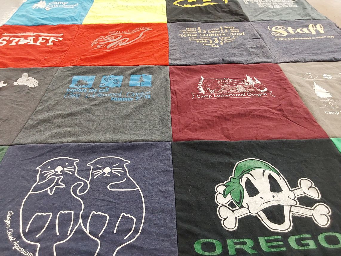 T-shirt quilt with camping, outdoors themes by Joanna from OR