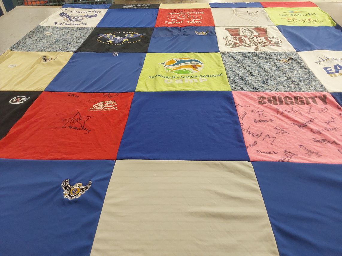 T-shirt quilt with sports, camping themes by SAHER from AZ
