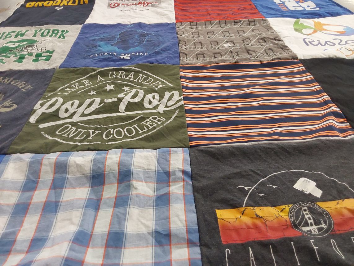 T-shirt quilt with travel, family themes by whitney from NY