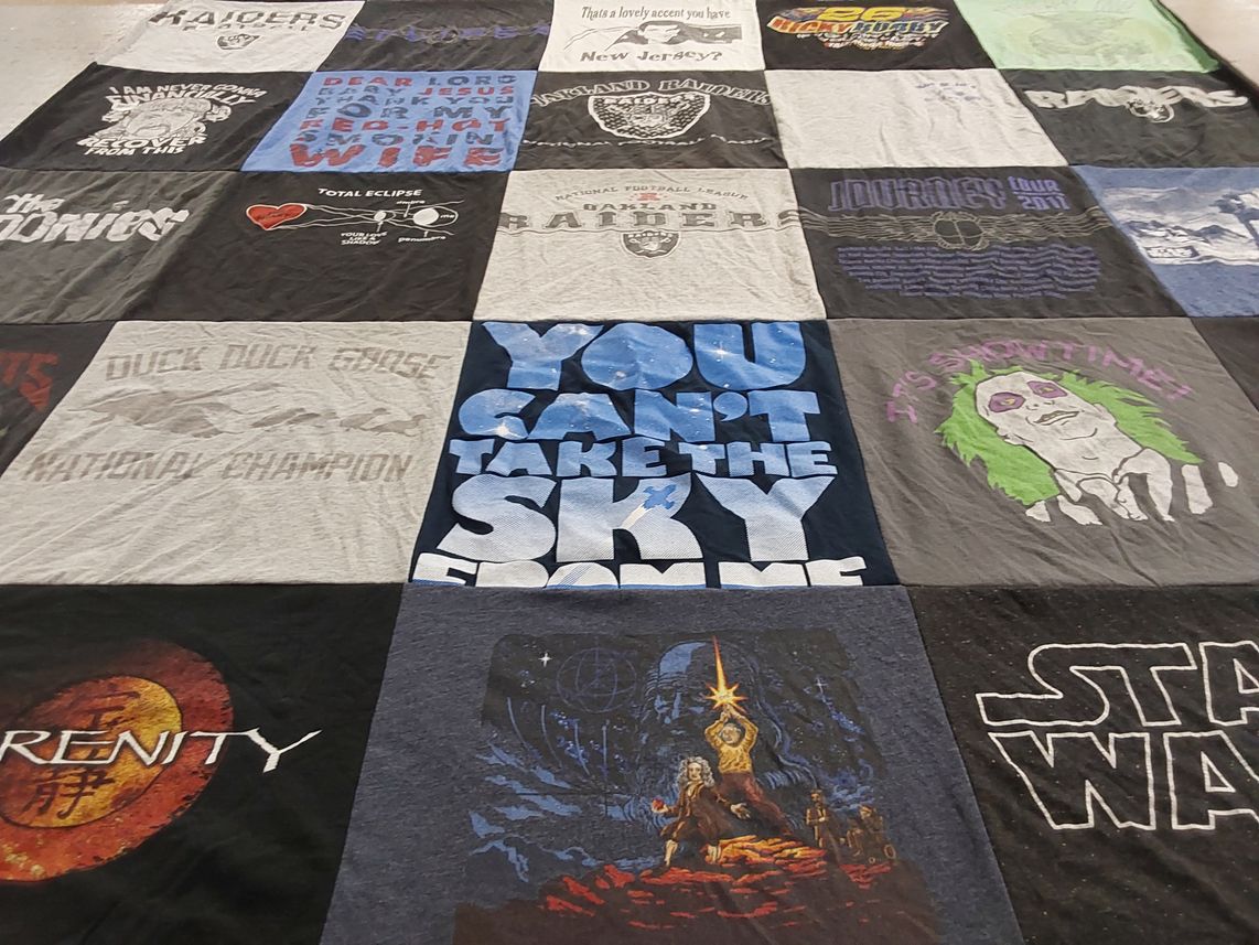 T-shirt quilt with music, films themes by Ben from ND