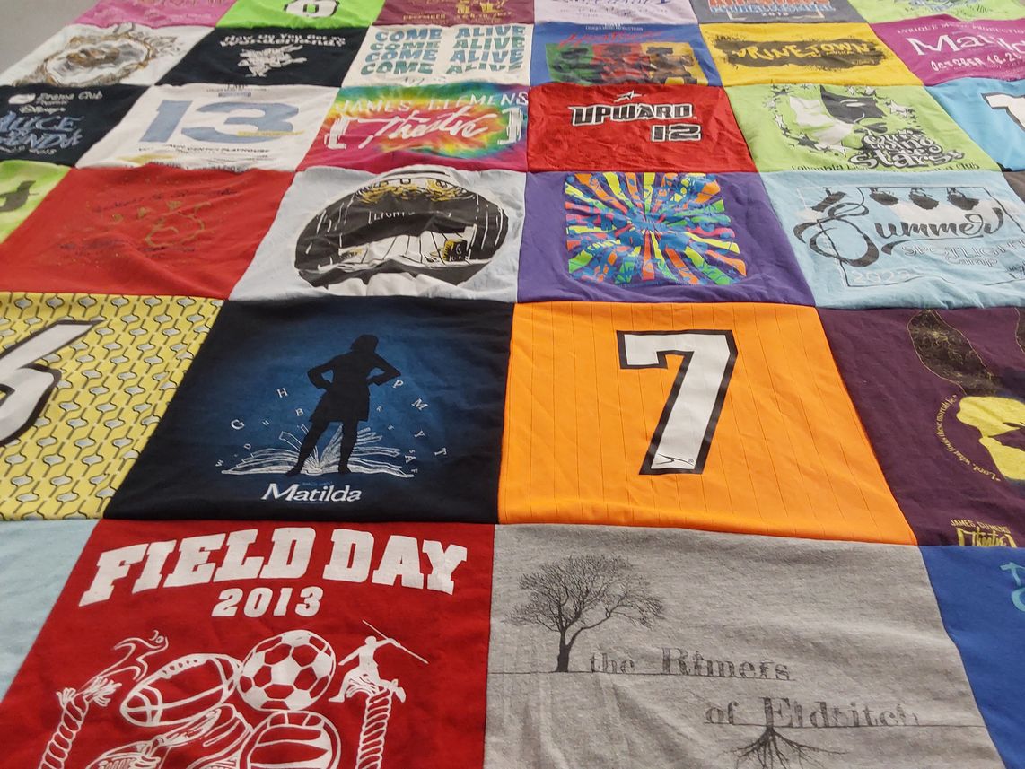 T-shirt quilt with theater, sports themes by Carly from AL