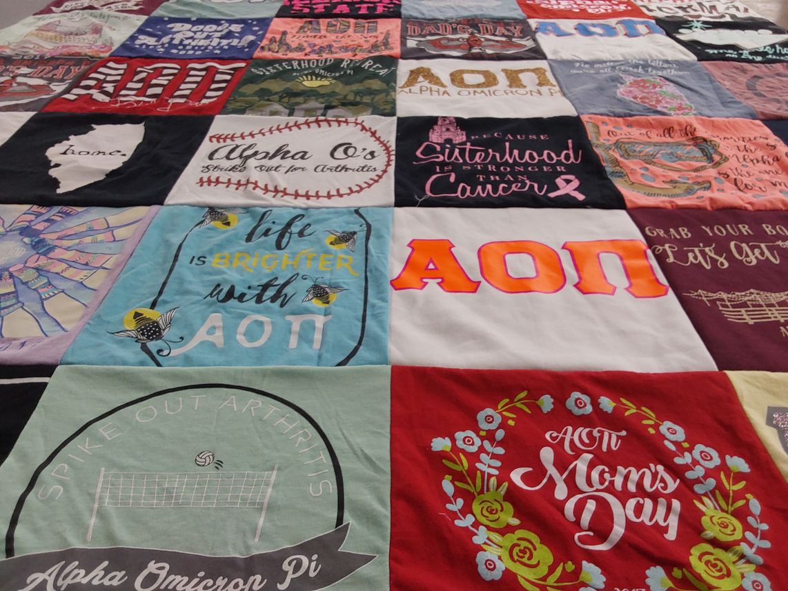 T-shirt quilt with sisterhood, volleyball themes by Jan from IL