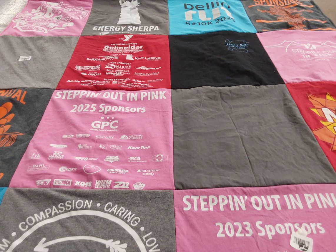 T-shirt quilt with running, sponsorship themes by Tina from WI