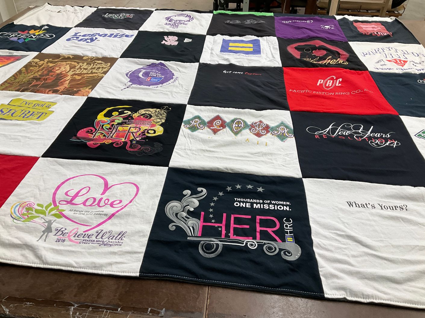 T-shirt quilt with community, support themes by Carmen from FL