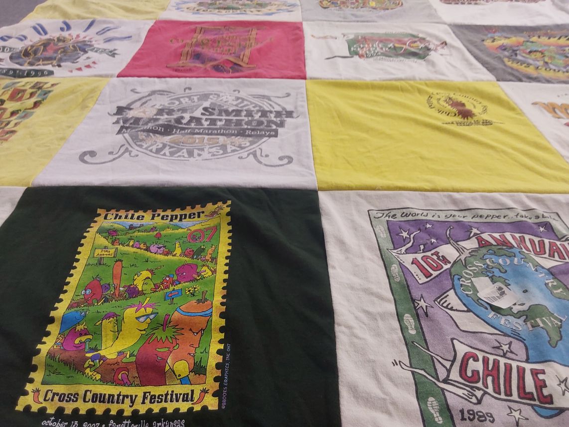 T-shirt quilt with running, festivals themes by Joan from AR