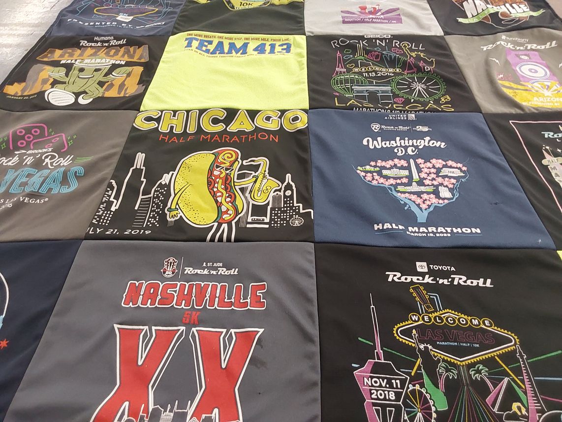 T-shirt quilt with running, marathons themes by Ann from MI