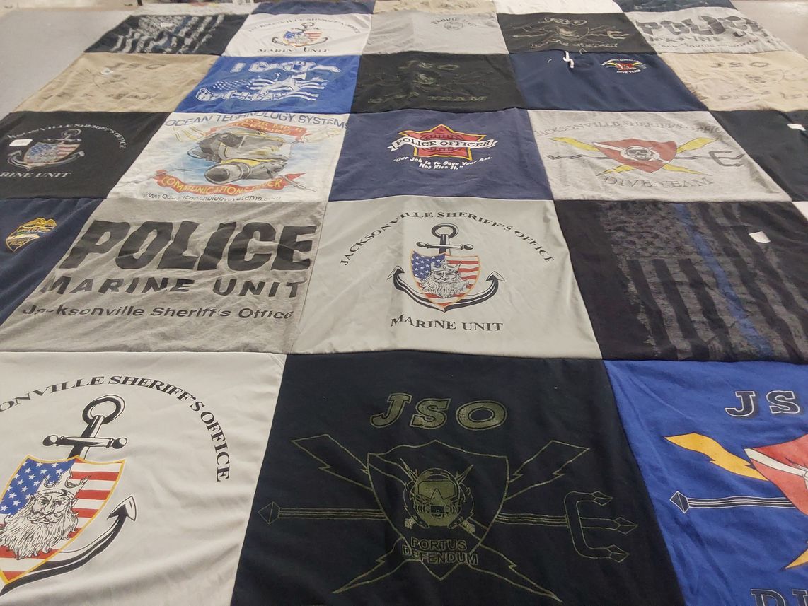 T-shirt quilt with law enforcement, technology themes by Dawn from FL