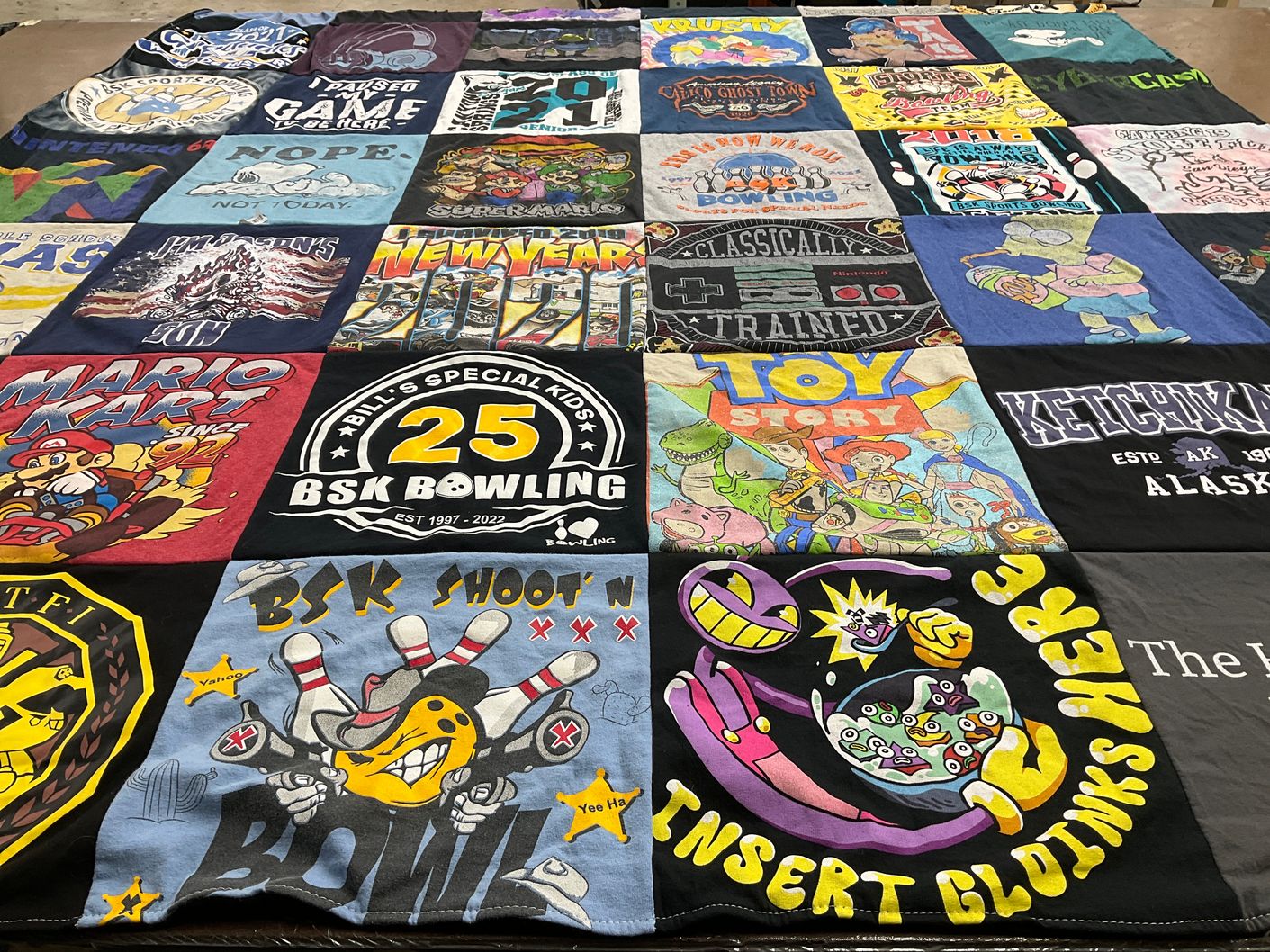 T-shirt quilt with gaming, movies themes by sonja from CA