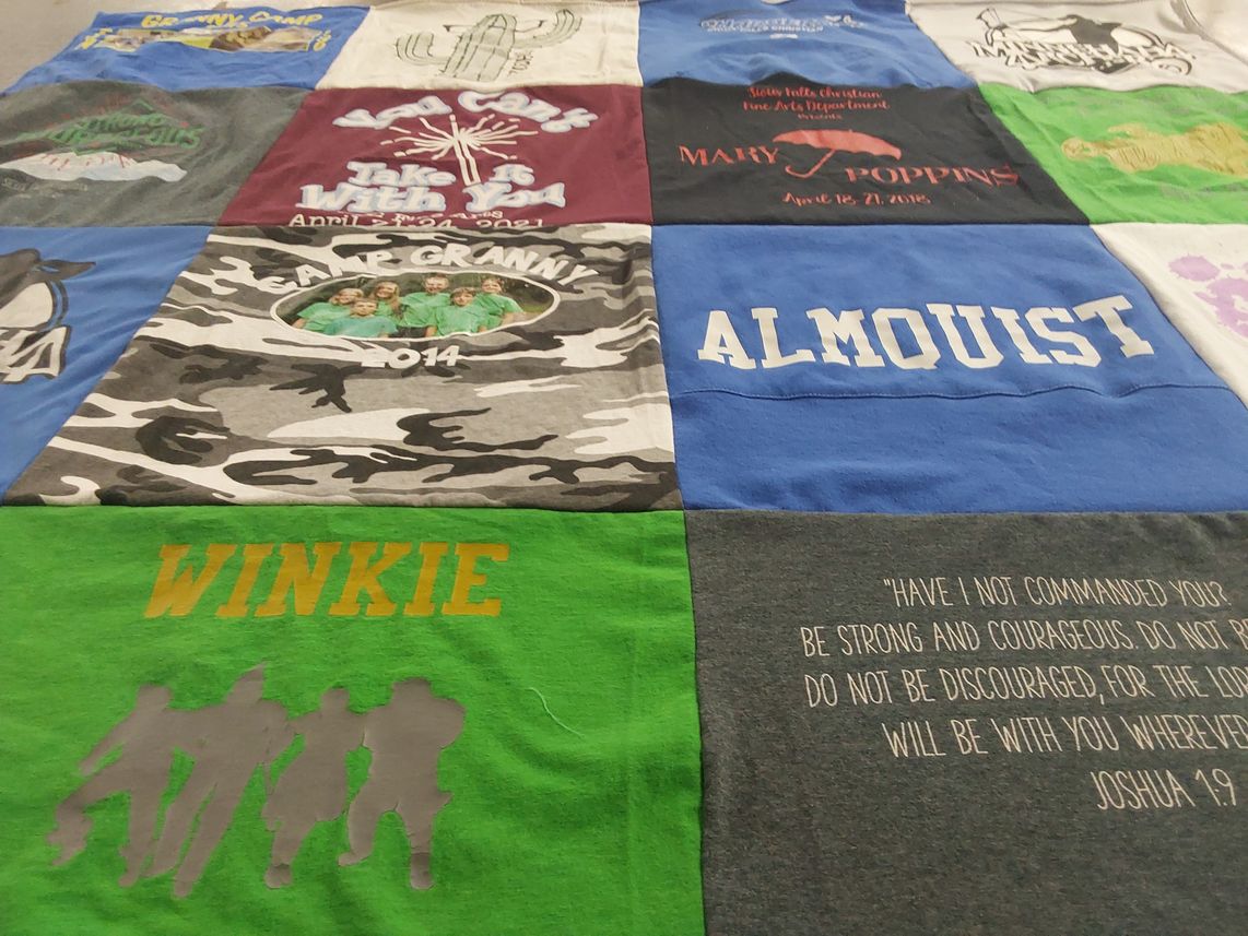 T-shirt quilt with camping, theater themes by Michele from SD