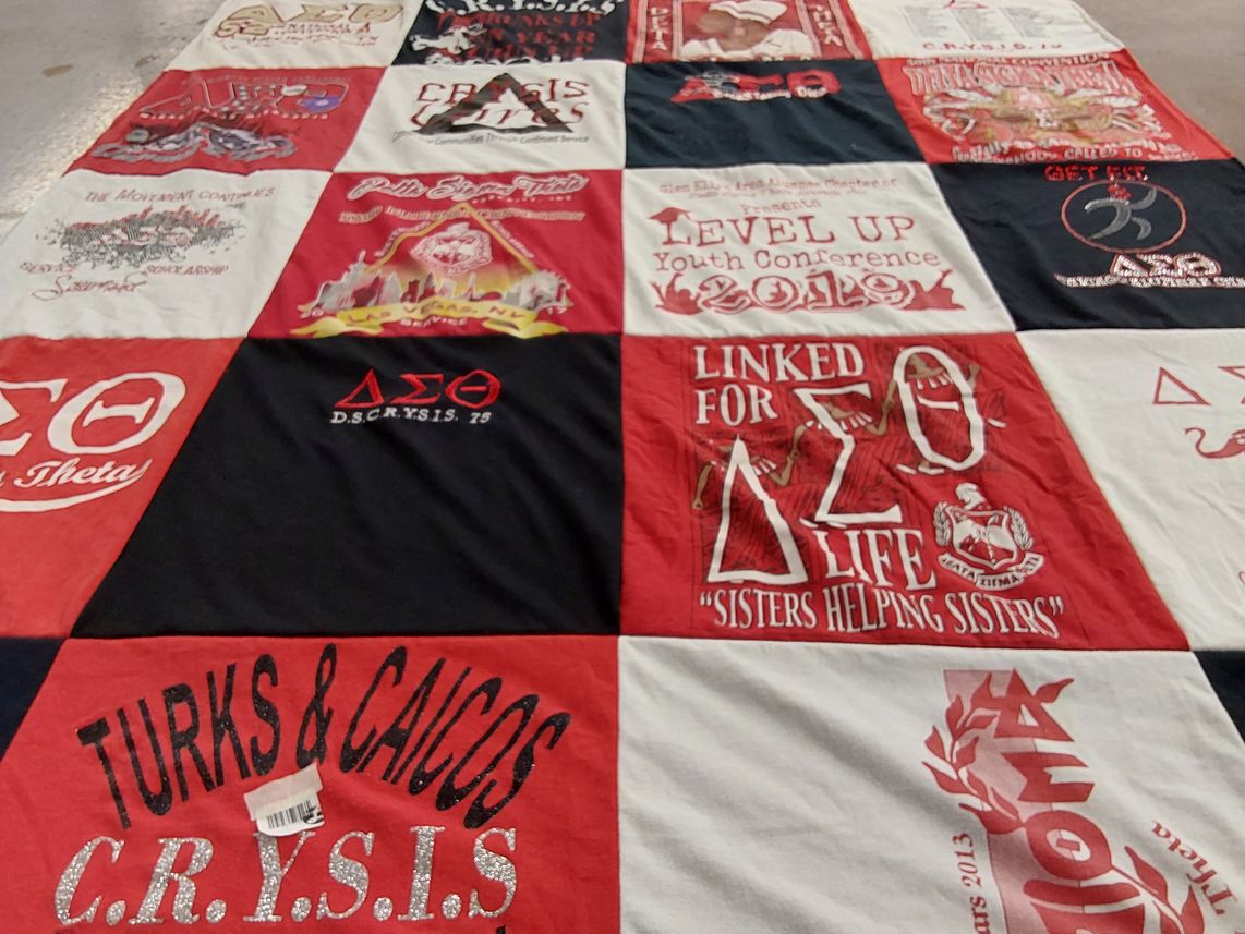T-shirt quilt with sisterhood, community service themes by Russell from IL